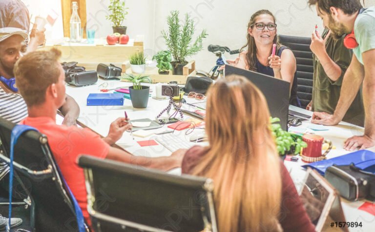 young coworkers team talking startup